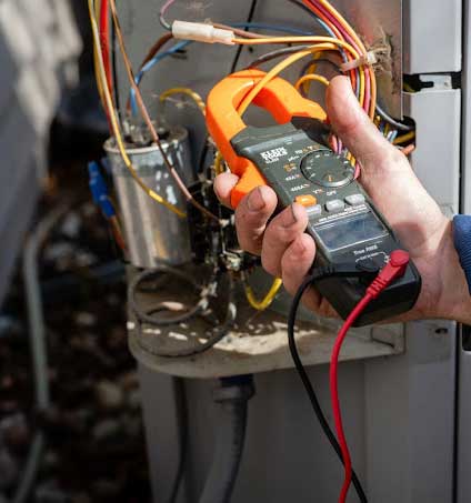 Electrical Testing AC Condenser with Multimeter
