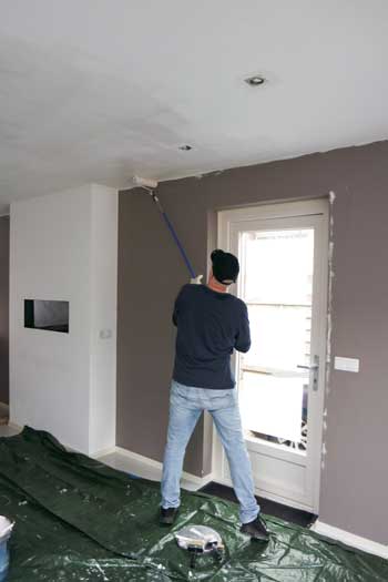 Worker Painting Ceiling